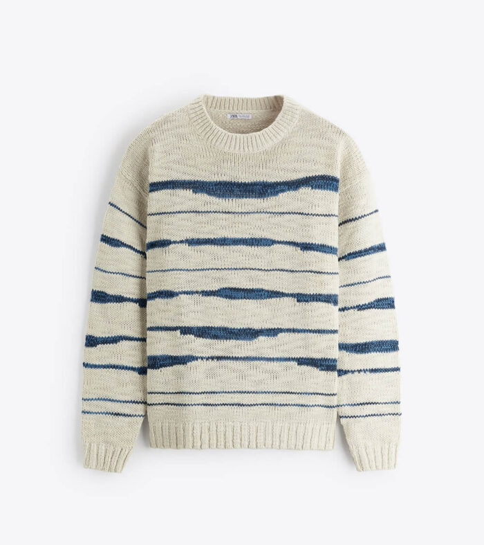 UNEVEN STRIPED SWEATER